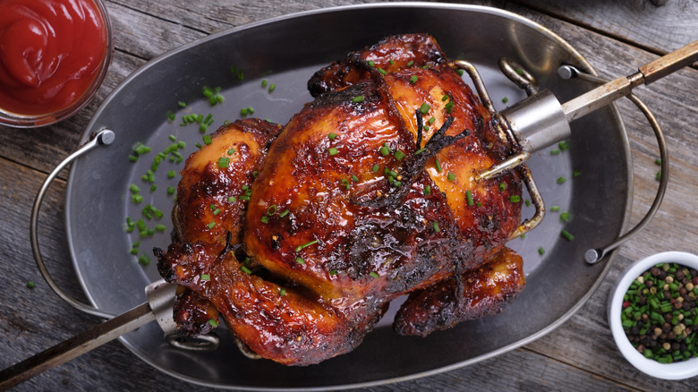 Grilled chicken on rotisserie attachment