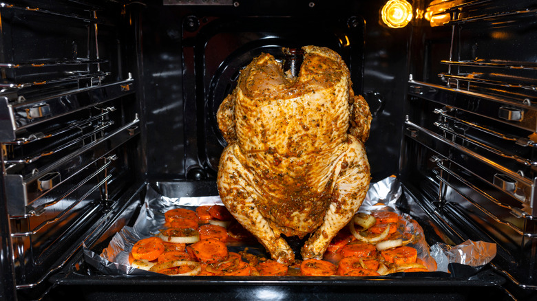 Roasting a chicken in the oven vertically like beer can chicken