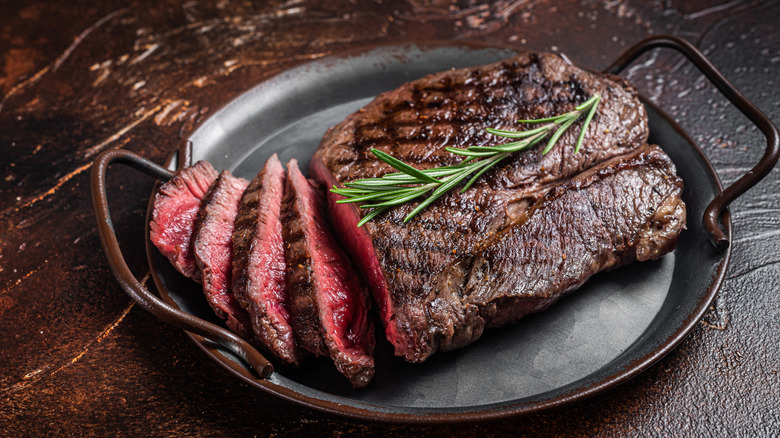 Grilled steak on a cast iron pan