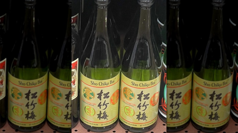 Two bottles of Sho Chiku Bai Classic Junmai Sake on a store shelf