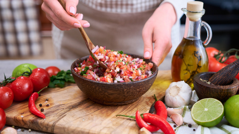 person making salsa