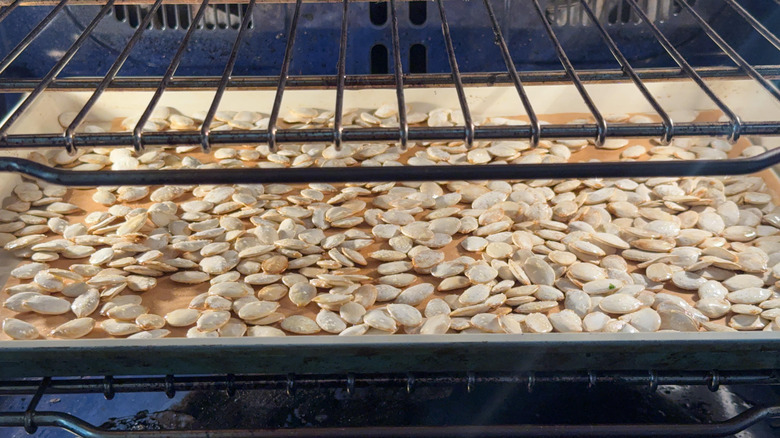 Pumpkin seeds in oven baking