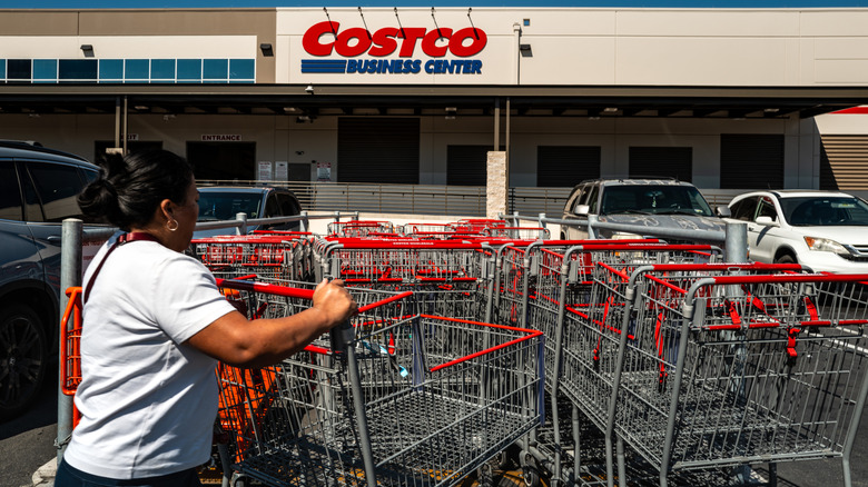 A shopper takes a cart at Costco