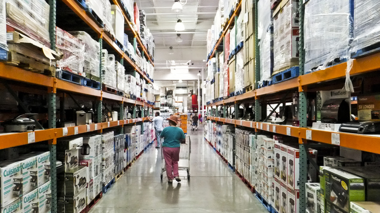 A shopper walks the aisles at Costco