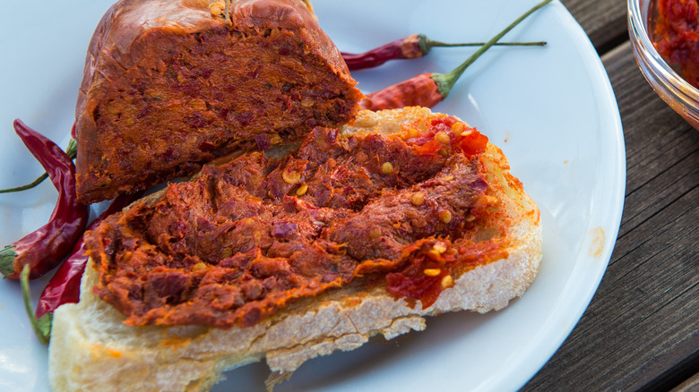 Nduja sausage spread across a piece of bread