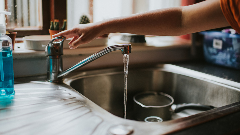 a stainless steel kitchen sink