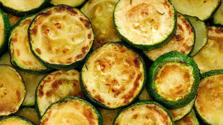 Slightly browned roasted zucchini rounds