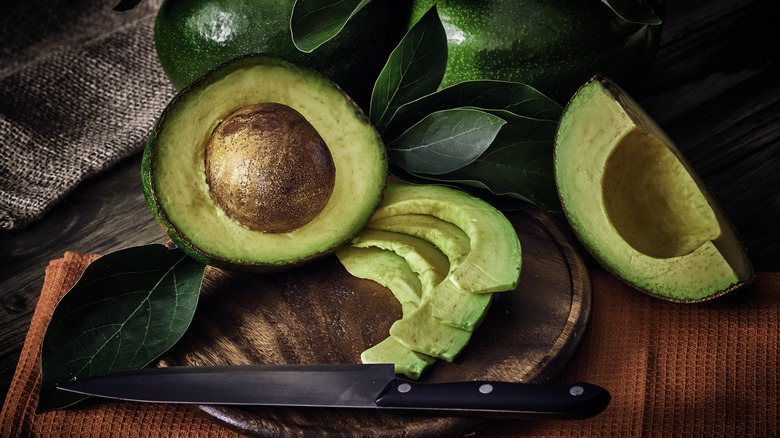 ripe green avocados sliced into slices