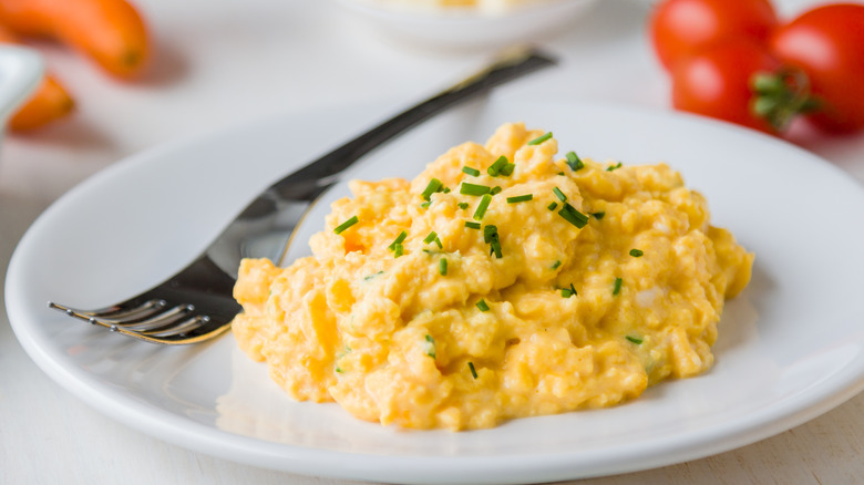 scrambled eggs garnished with chives