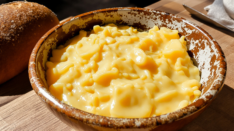 A bowl of creamy scrambled eggs.