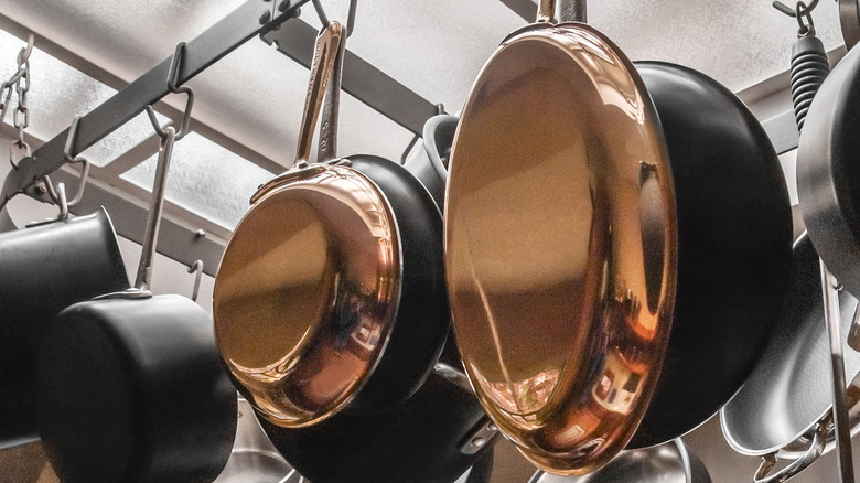 copper pans hanging