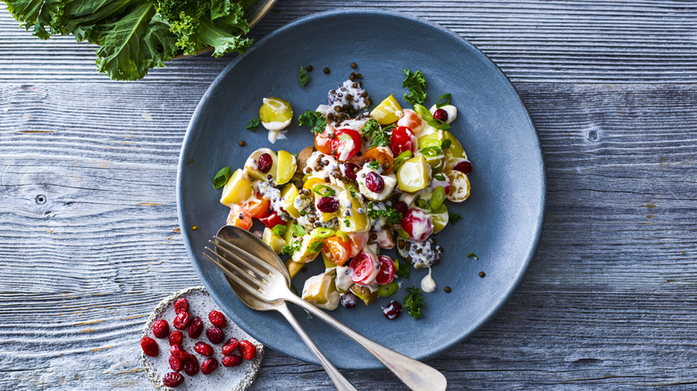 Potato salad with cream and garnishes