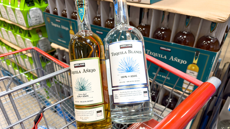 Bottles of Kirkland tequila in shopping cart