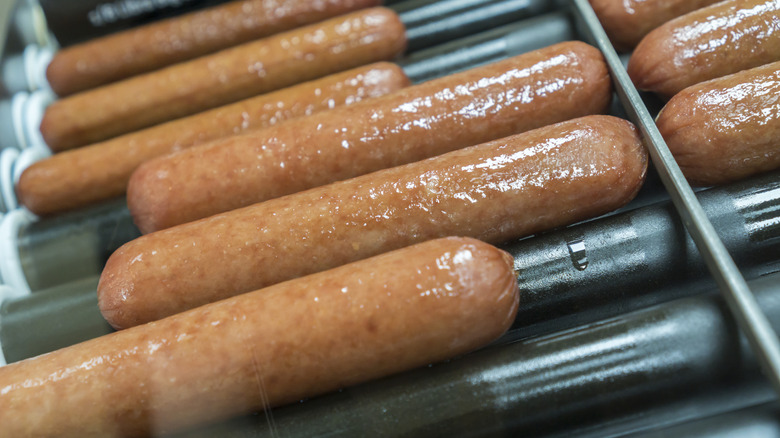 Big Bite Hot Dogs from 7-Eleven twirling on their rollers