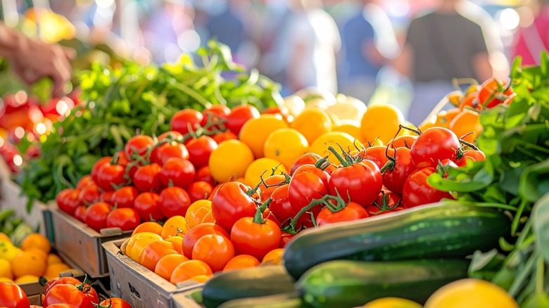crates of fresh produce at an open market