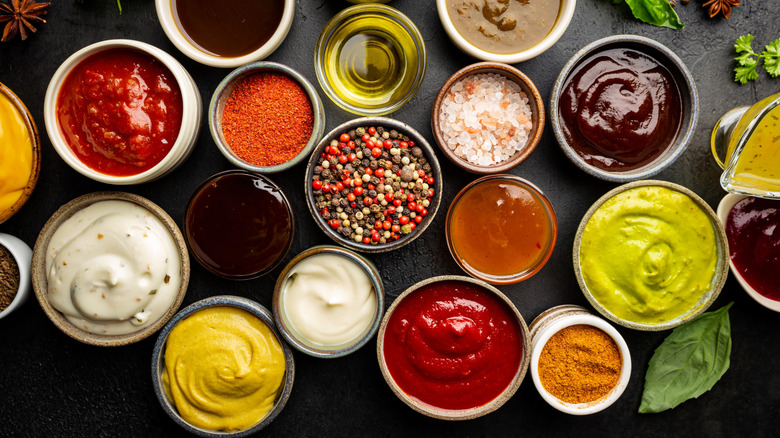 Bowls filled with different condiments and ingredients