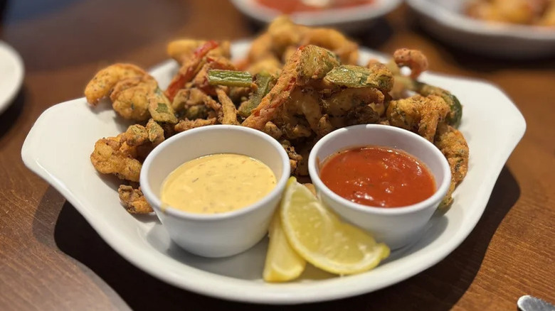Fried pieces of food with dip