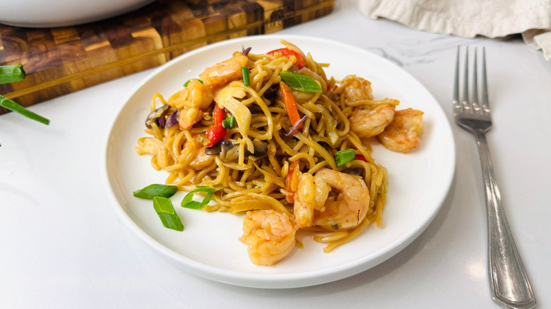 Shrimp lo mein serving on plate