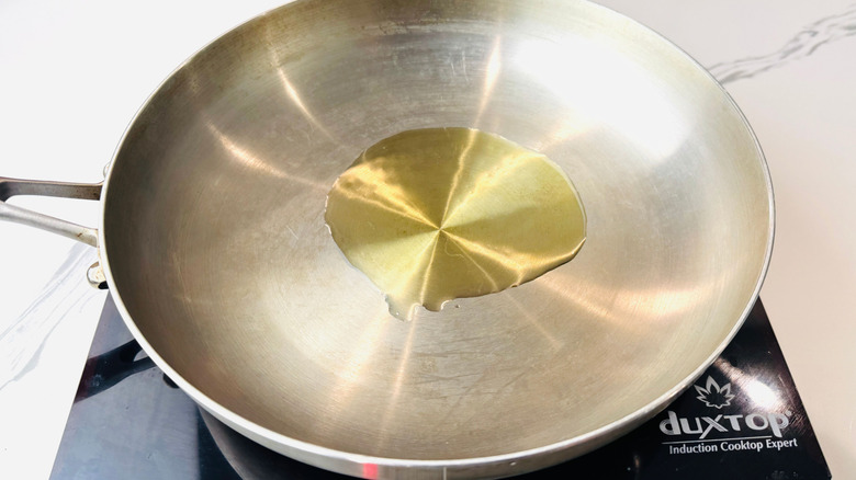 Oil in large pan