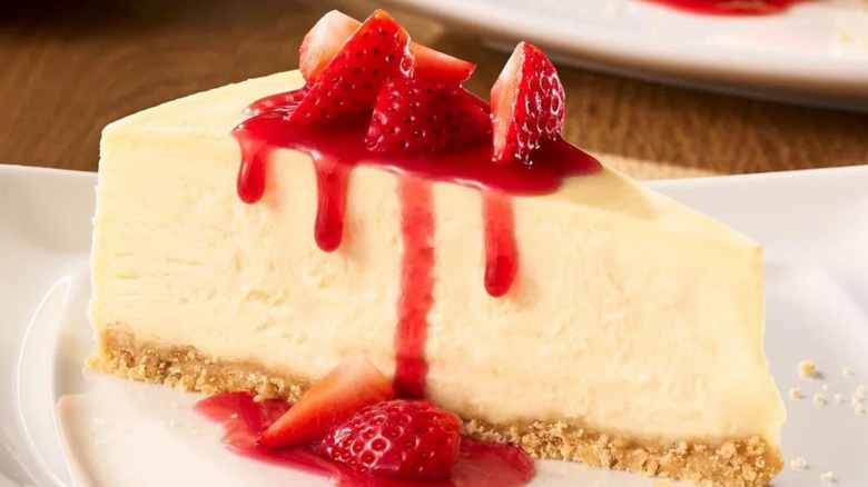 Olive Garden Sicilian Cheesecake with strawberry topping on a white plate