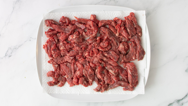 steak strips on a white paper towel