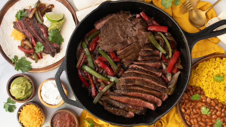 Overhead shot of sizzling steak fajitas