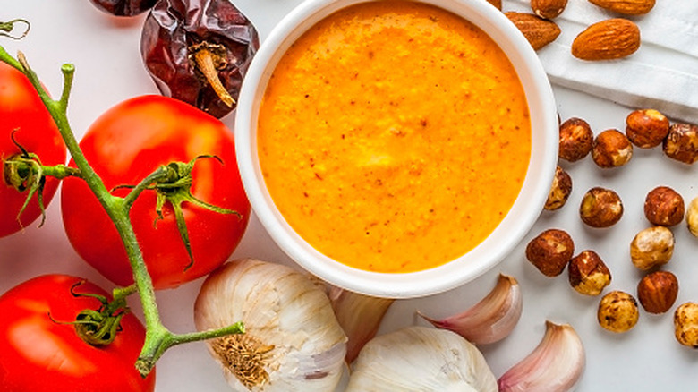 romesco sauce surrounded by traditional ingredients