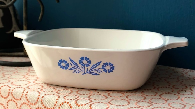 A CorningWare Petite Pan sits on a table