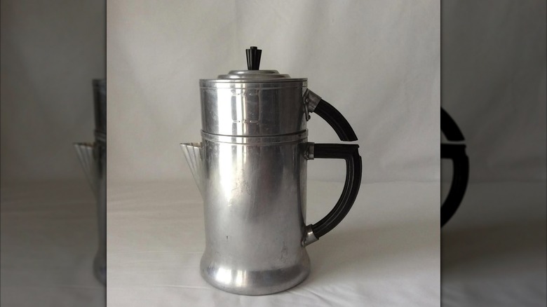 A WearEver coffee pot sits on a table