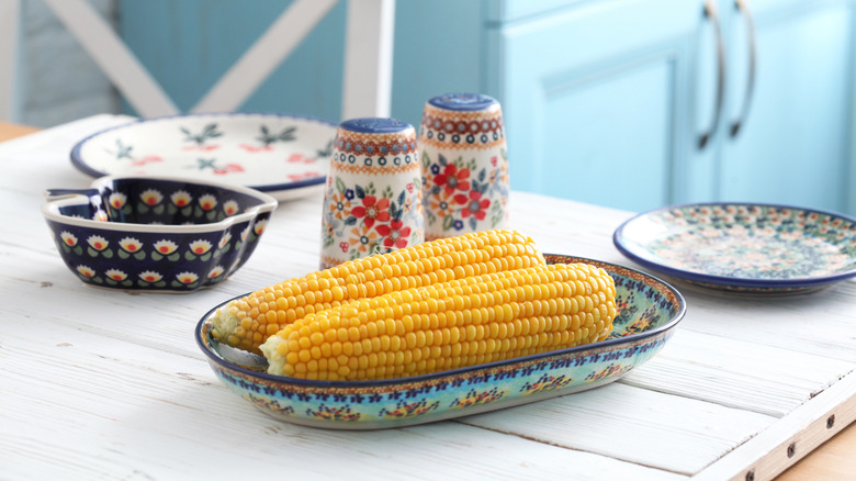 Buttery grilled corn on the cob dusted with herbs