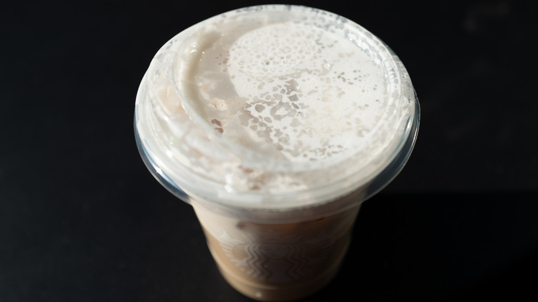A Starbucks Chai with cold foam on top