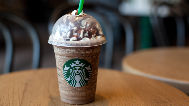 A Starbucks cup with Mocha Cookie Crumble Frappe