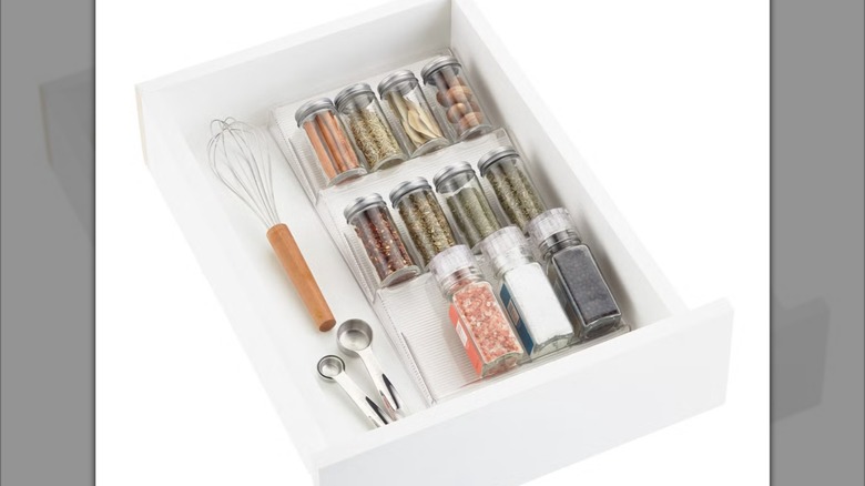 The iDesign Linus in-drawer spice rack from The Container Store.