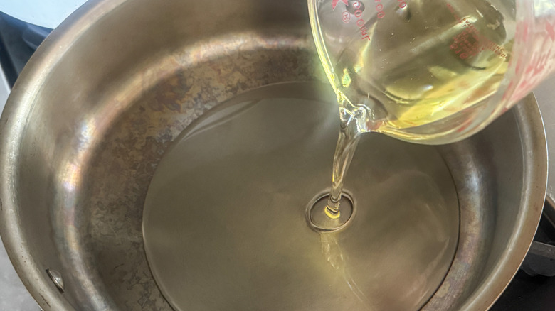 oil pouring into pan