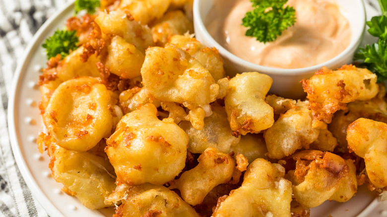 Cheese curds served with dipping sauce