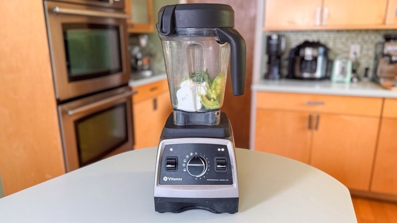 Avocado crema ingredients in blender pitcher