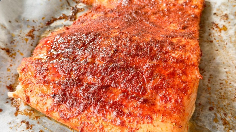 Close up of seasoned and slow-baked salmon filet