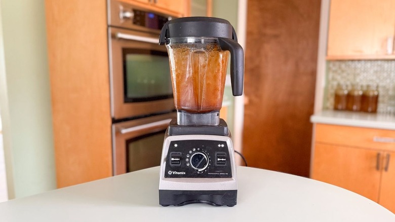 Pureeing Kahlua apricot glaze ingredients in blender