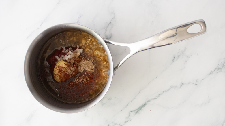 Barbecue sauce ingredients in a small saucepan