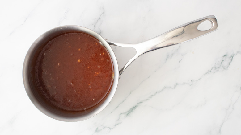 Composed barbecue sauce in a small saucepan