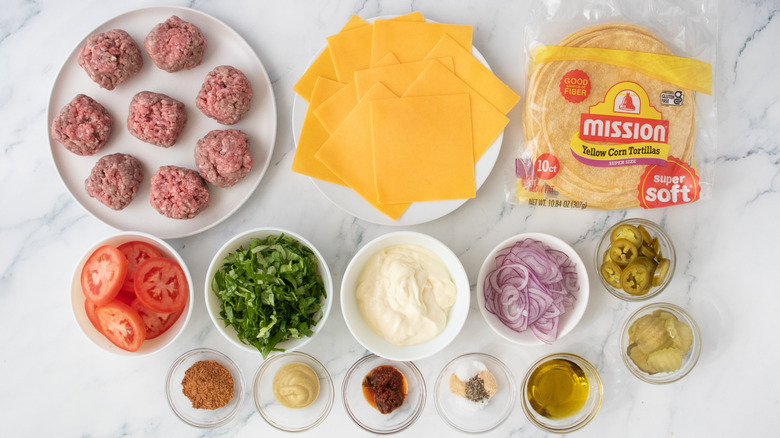 Smash burger taco ingredients on countertop
