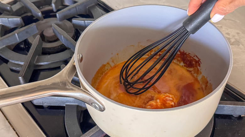 hand whisking sauce