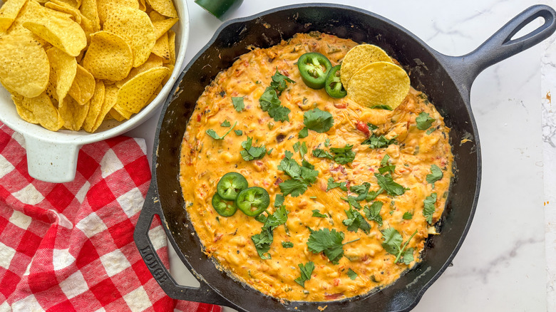 cast iron skillet with queso