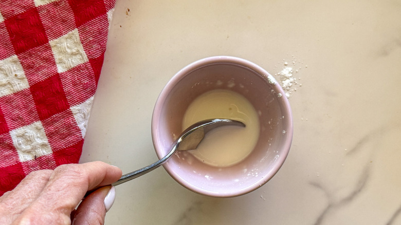 hand stirring slurry