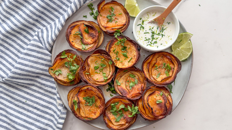 plate of potato stacks with sauce