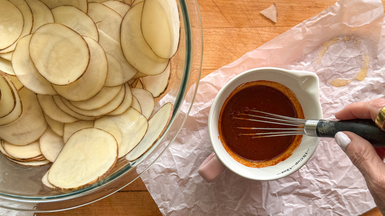 hand stirring butter mixture