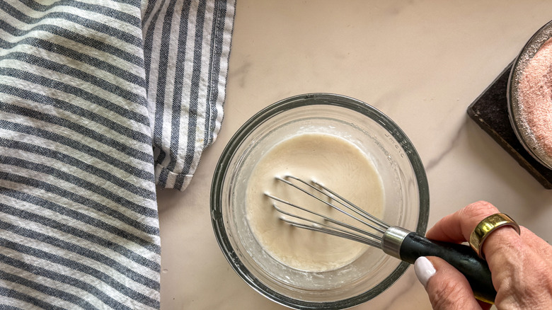 hand whisking sauce