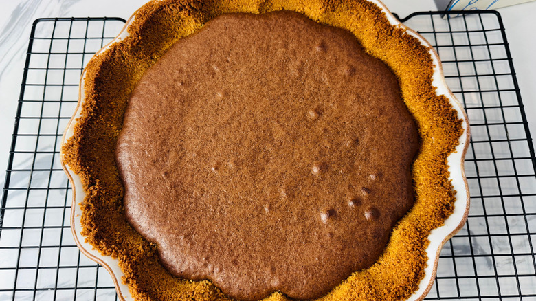 Baked brownie pie on wire rack