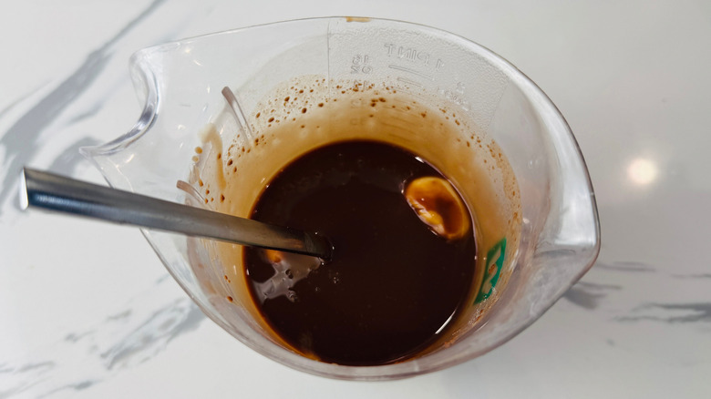 Melted chocolate and butter in measuring cup