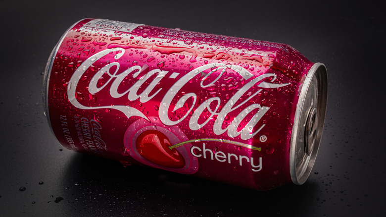a can of Cherry Coca-Cola is turned on its side